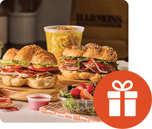 A spread of sandwiches, sides and drinks from the Harmons kitchen